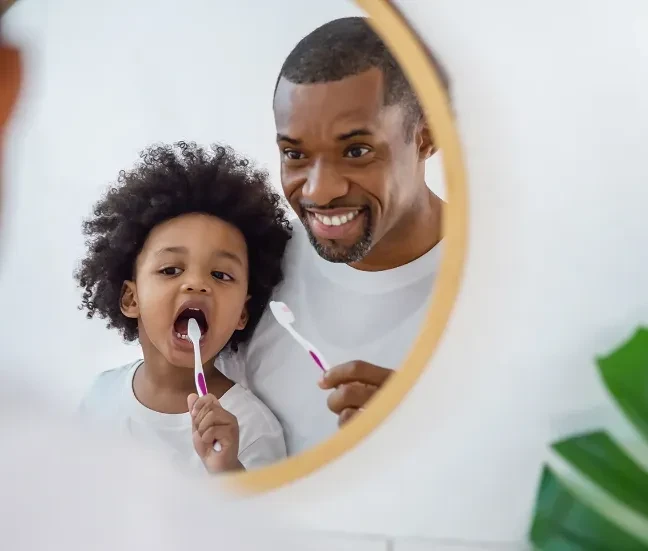 Dentist Performing Tooth Extraction – Elite Dental Inverness FL