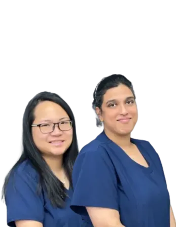 Smiling Dentist with Dental Tools – Elite Dental Inverness FL